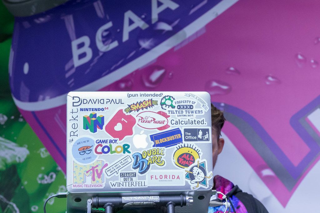 DJ with 90s Stickers on Macbook at Fibo in Cologne, Germany