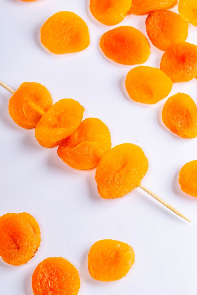 Dried apricots on white background (Flip 2019)