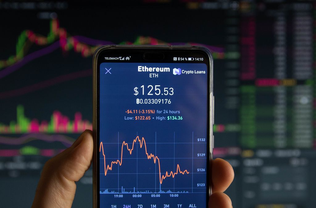 Ethereum cryptocurrency price graph chart on mobile phone screen