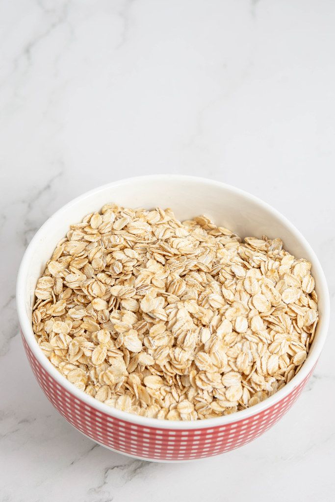 Flat lay above Dry Oatmeal in the bowl