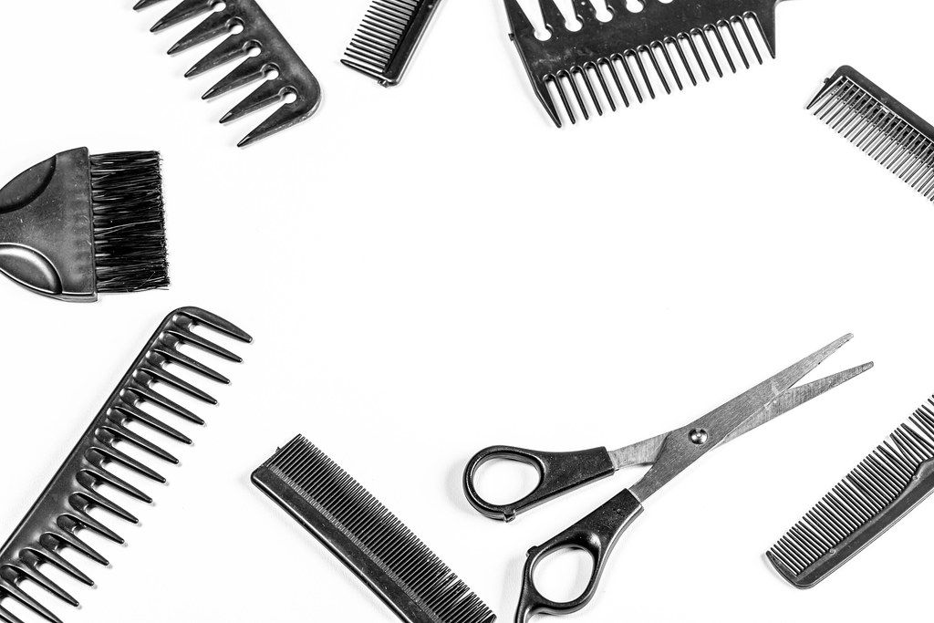 Frame of different hair combs with free space in the middle