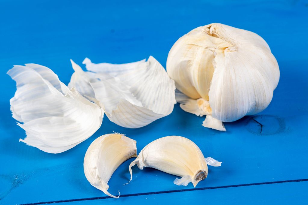 Fresh Garlic on the wooden board (Flip 2019)