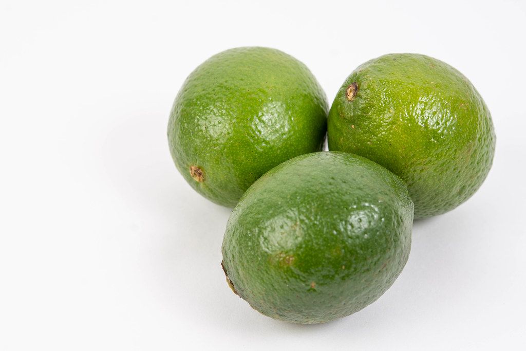 Fresh Green Limes on the white background