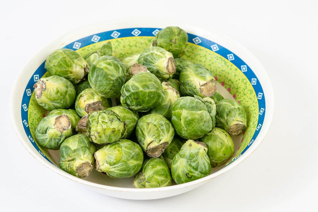 Fresh raw healthy Brussel Sprouts in the bowl (Flip 2019)