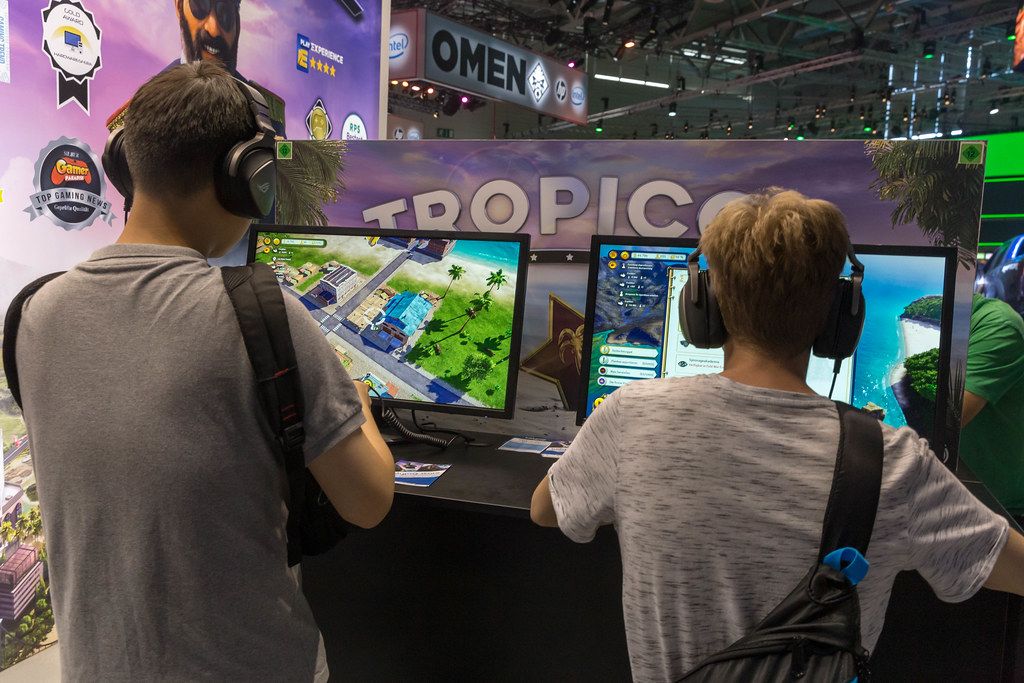 Gamescom video game station: kids play the strategic simulation game Tropico 6  by Limbic Entertainment