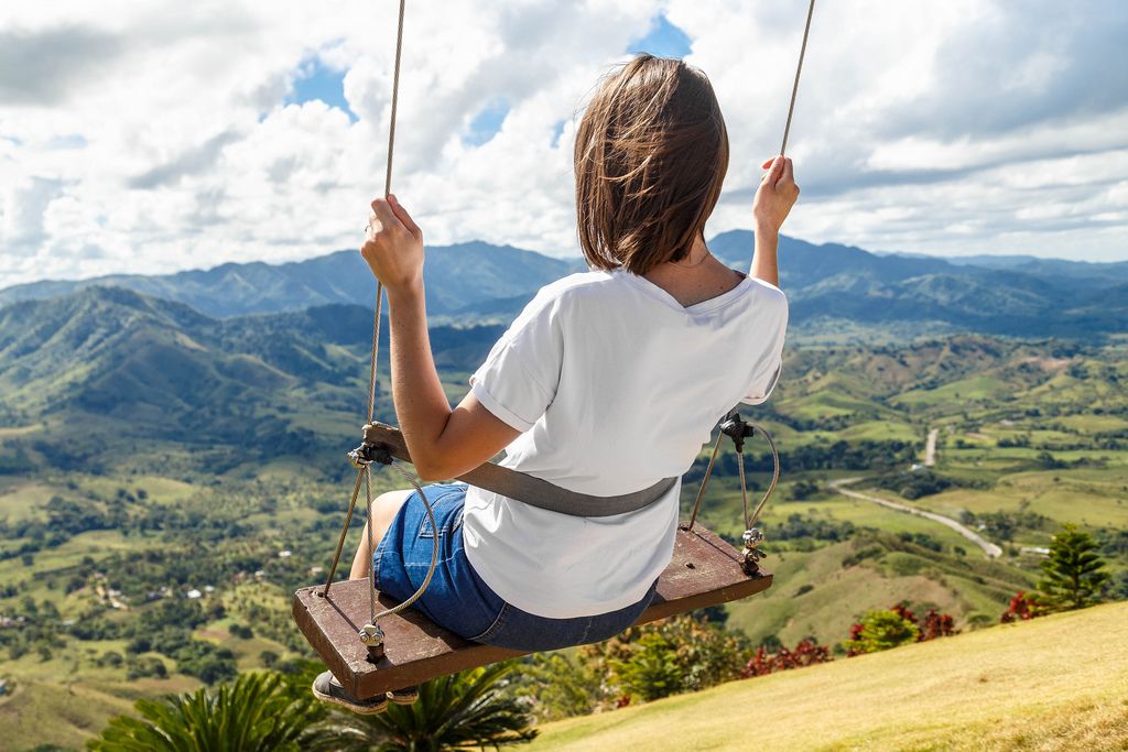Girl on swing at the clouds in mountain Redonda at Dominican Republic (Flip 2019) (Flip 2019) Flip 2019