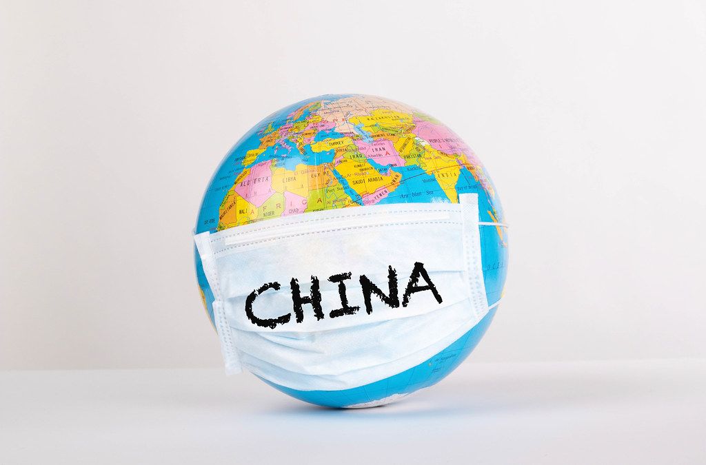 Globe with medical mask and China text
