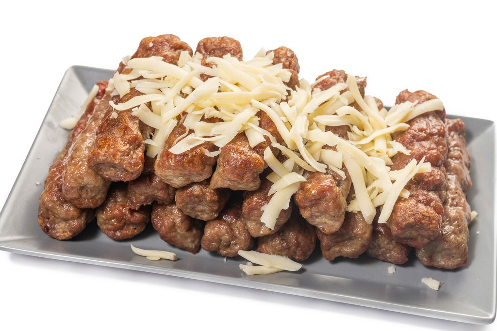 Grated Cheese on the fried Minced Meat Kebabs