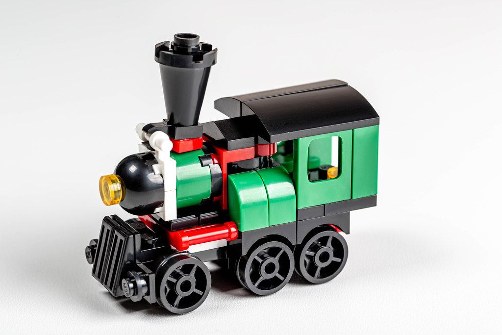 Green plastic train on a white background
