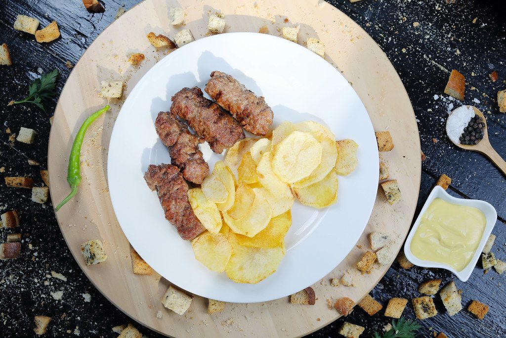 Grilled minced meat rolls with potatoes