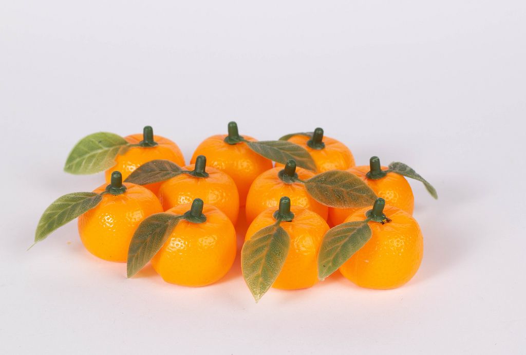 Group of fresh orange fruits on white background