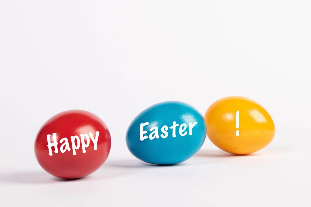 Happy easter text written on Easter eggs