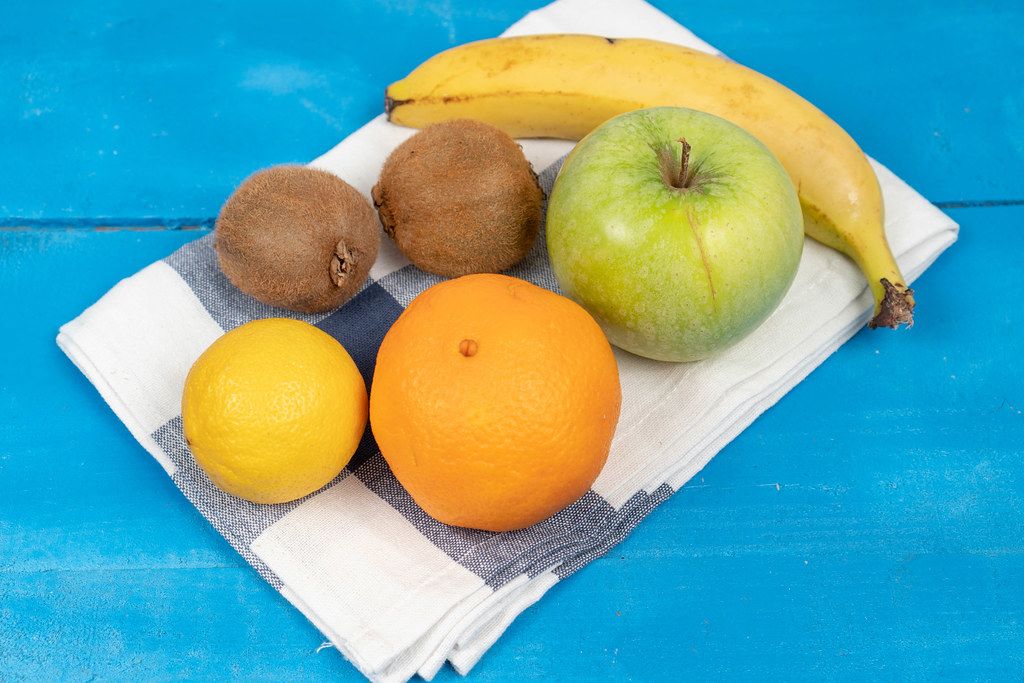 Healthy and fresh fruits on the kitchen dishcloth