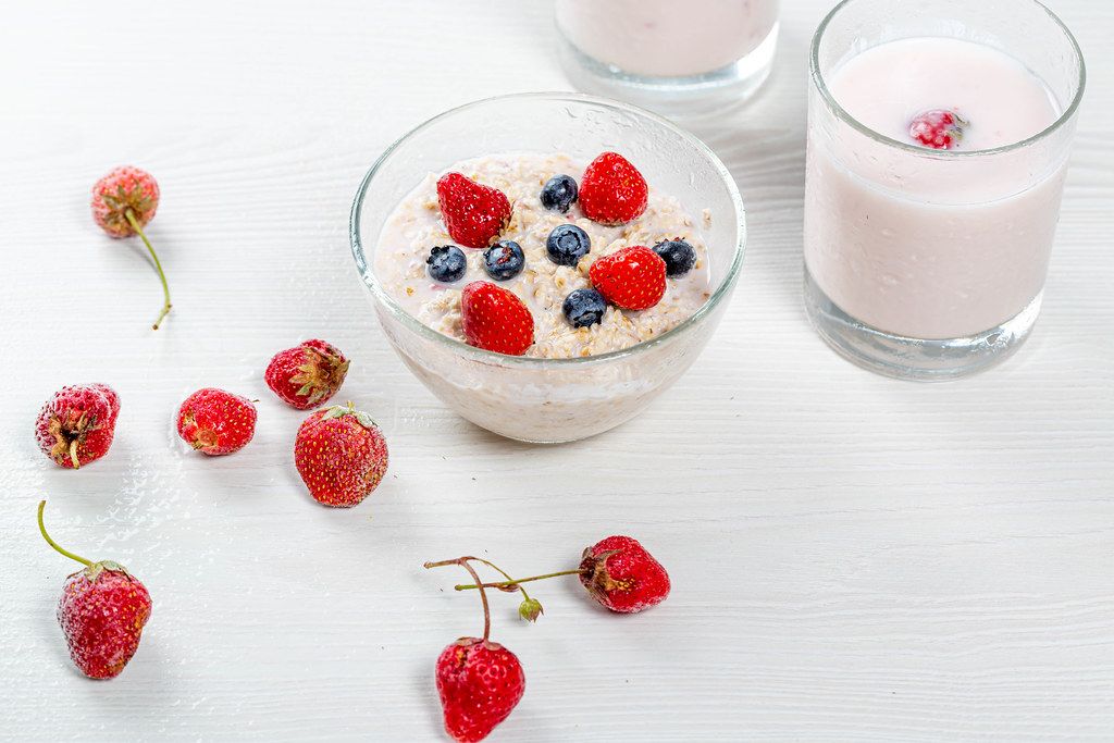 Healthy Breakfast concept. Oatmeal with berries and yogurt