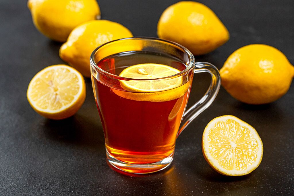 Eine Tasse Tee mit frischer Zitrone und Honig - Creative Commons Bilder