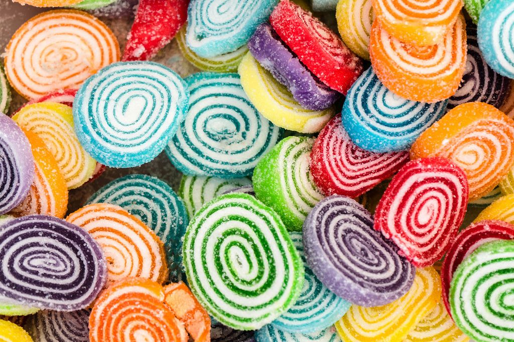 High Angle View of the Bulk of Colorful Gummy Jelly Candy Rolls
