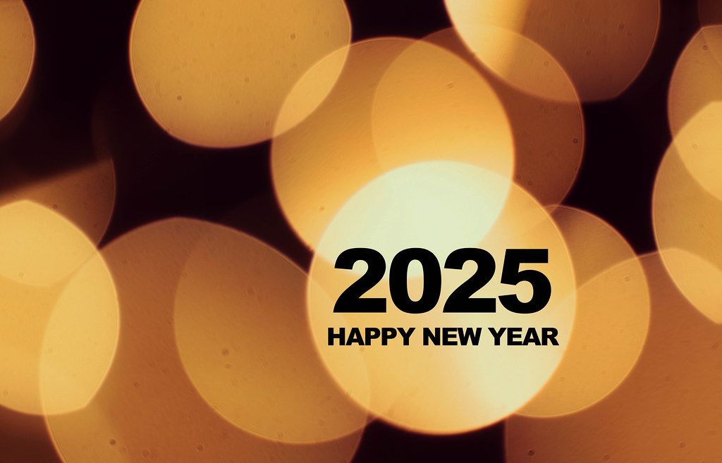 Hintergrundbild mit hellen, gelben Kreisen wünscht zum Neujahrsanfang ein Frohes Neues Jahr 2025