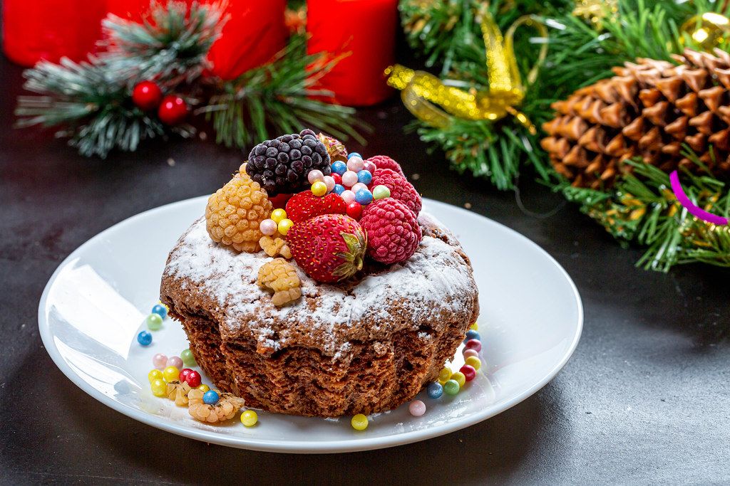 Homemade Christmas cupcake with strawberries, raspberries and mulberries (Flip 2019)