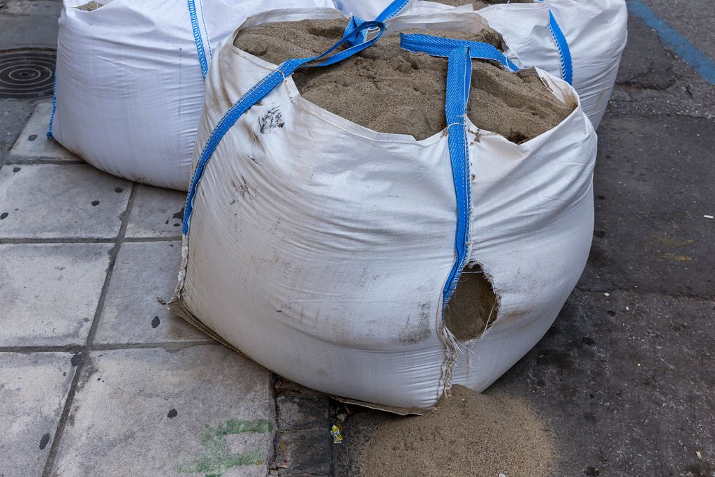 Huge sacks full of sand at a construction site