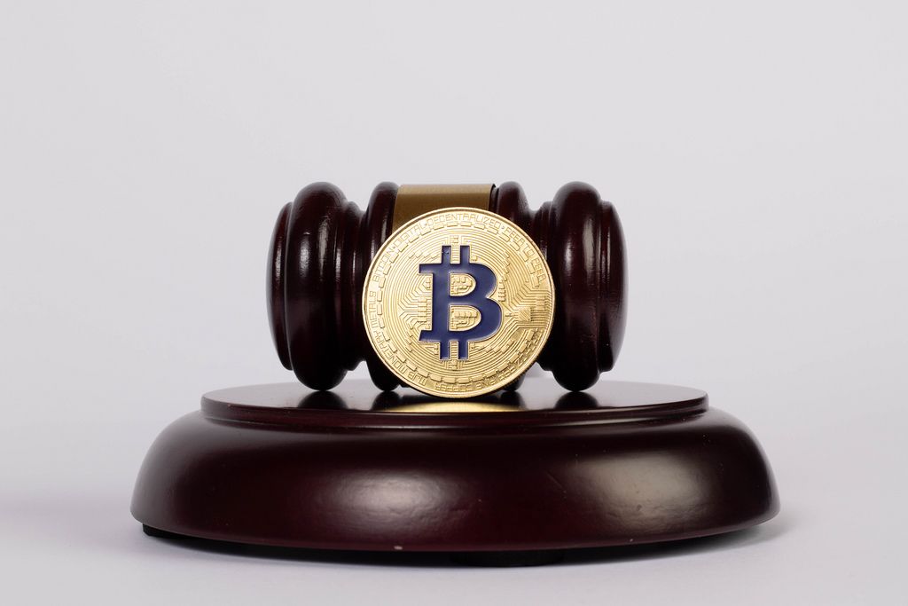 Law gavel and golden Bitcoin