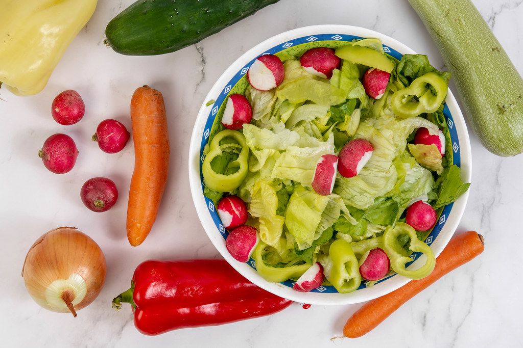 Lettuce salad with Red Radishes and Paprika and vegetables (Flip 2019 ...