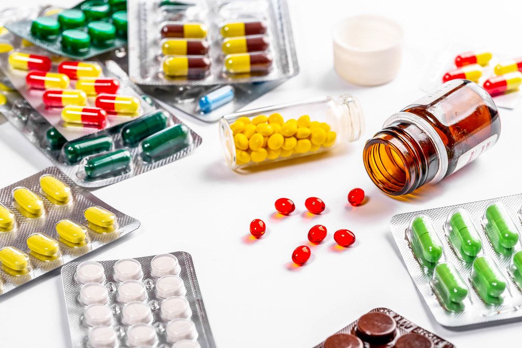 Yellow Pills lollipops In A Blister On A White Background Flip 2019 