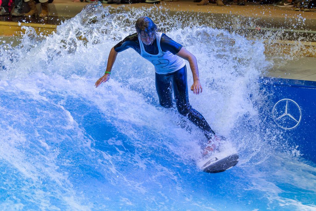 Man surfing in the Surfpool by Citywave at fair Boot Düsseldorf 2018