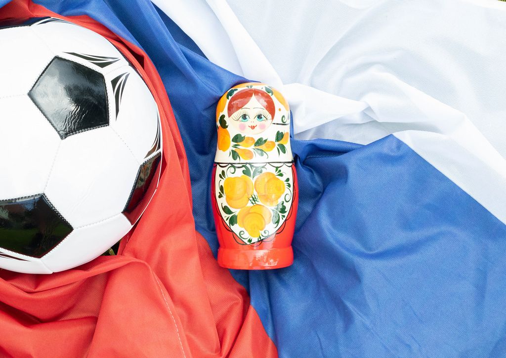 Matryoshka doll with soccer ball on Russian flag