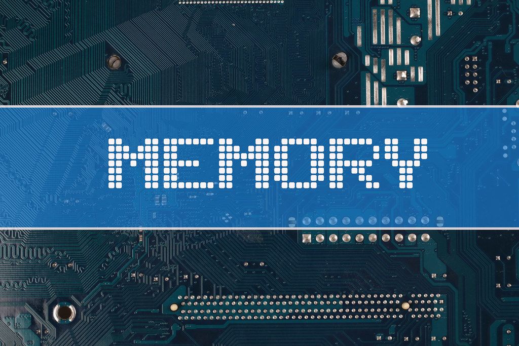 Memory text over electronic circuit board background