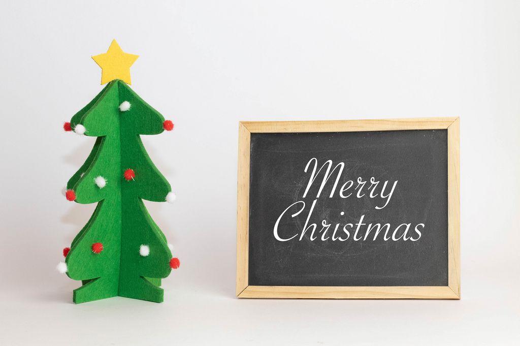 Merry Christmas text with Christmas tree