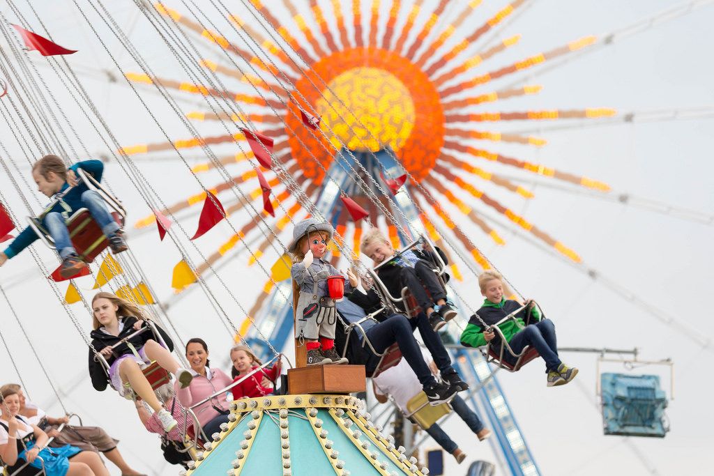 Merry-go-round and Ferris wheel in the background - Oktoberfest 2017