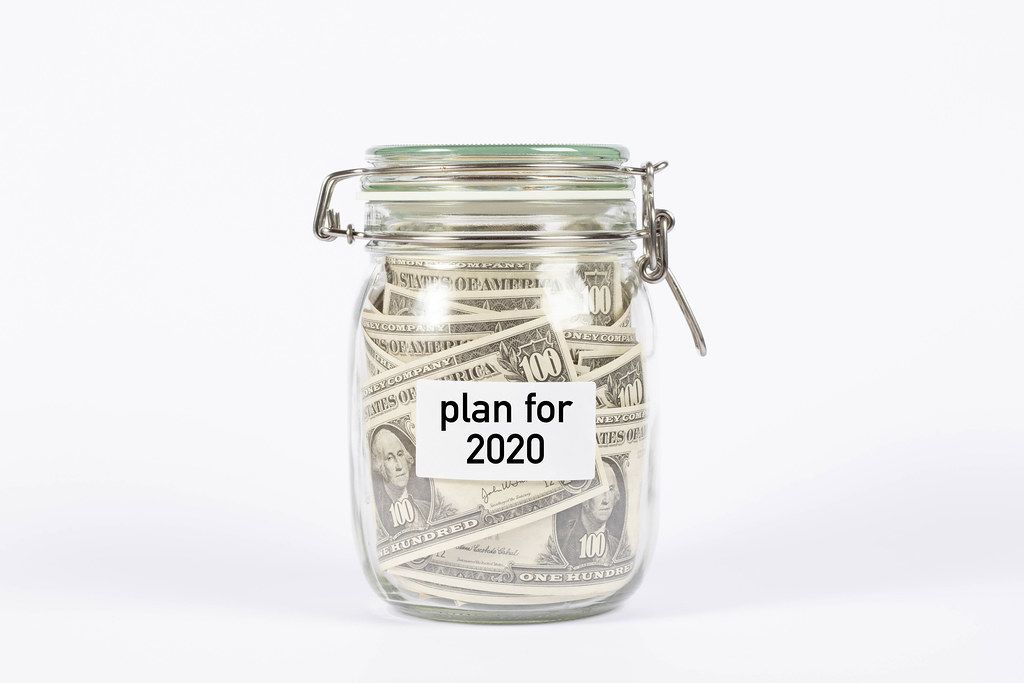 Money jar with plan for 2020 label