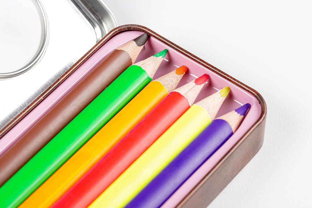 Multi-colored pencils in a pencil case close-up