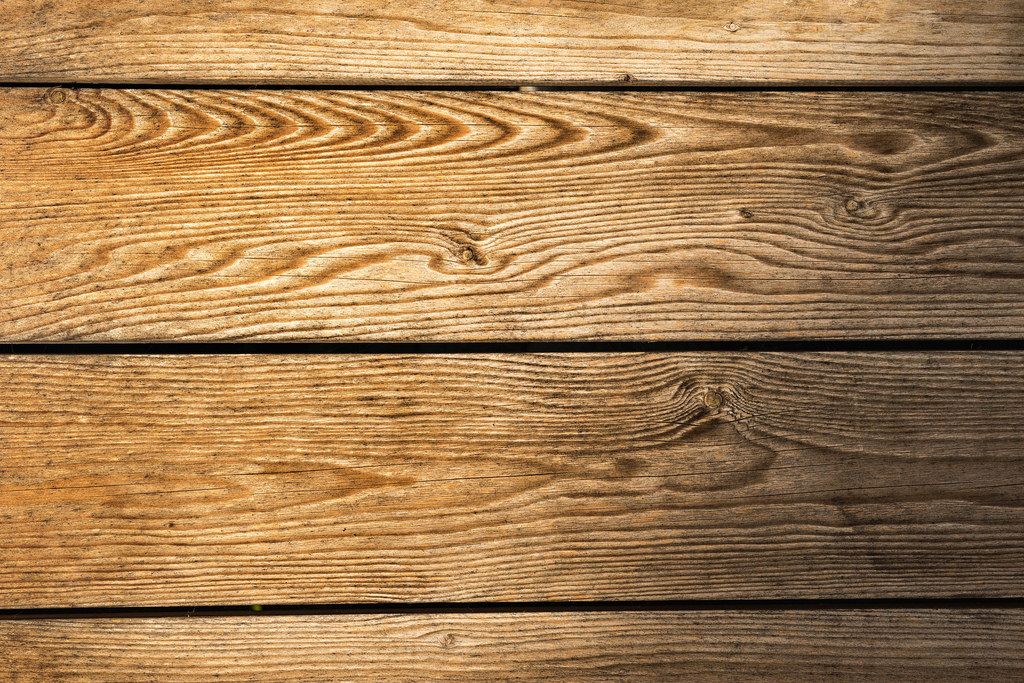 Musterungen in dem Planken einer Holzwand