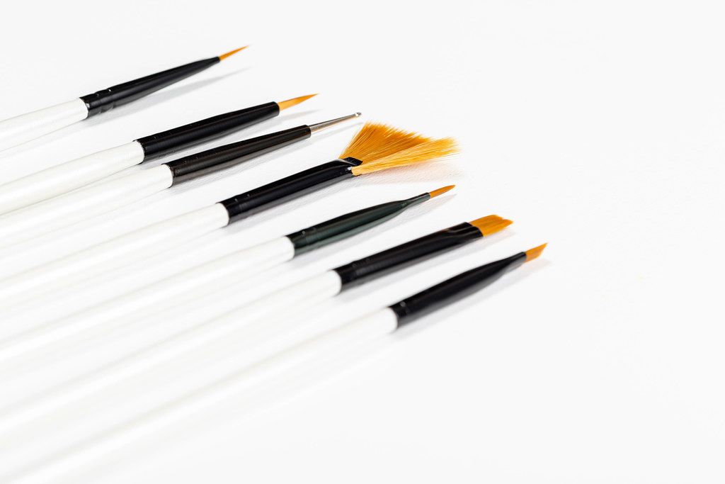 New brushes for applying makeup on a white background