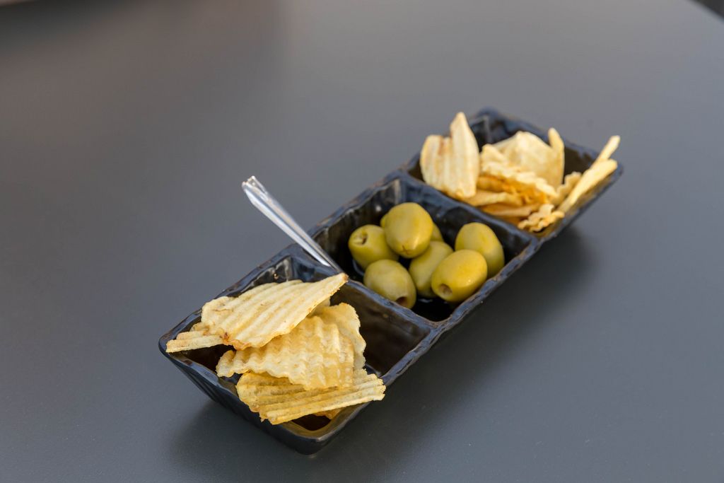 Olives and potato chips as a snack in Rome