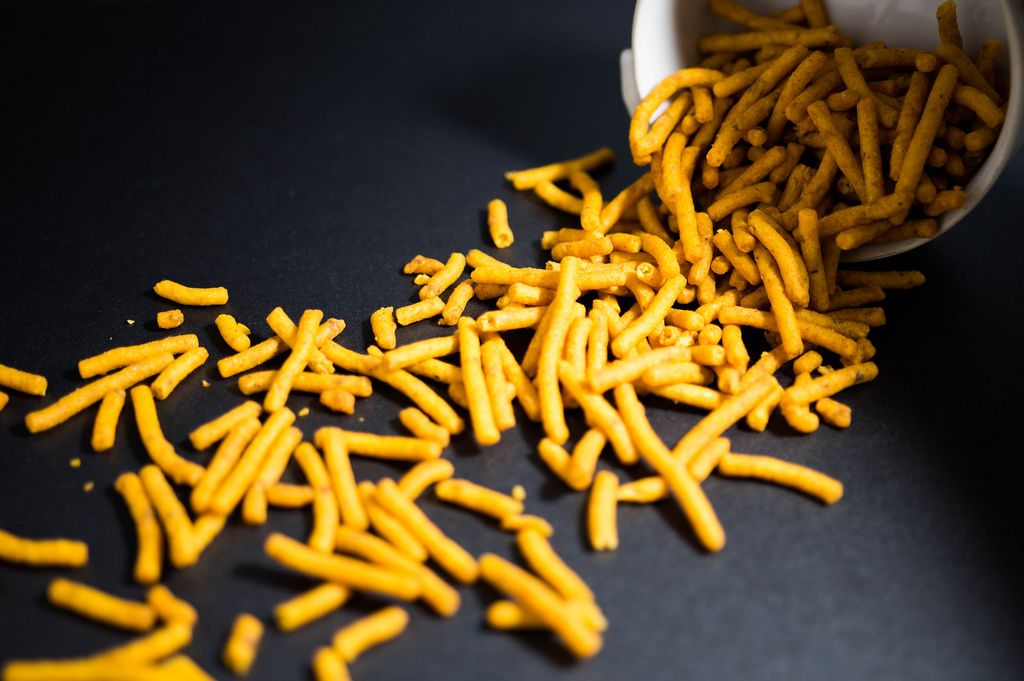 Orange Stick Chips Coming Out Of A Bowl Creative Commons Bilder