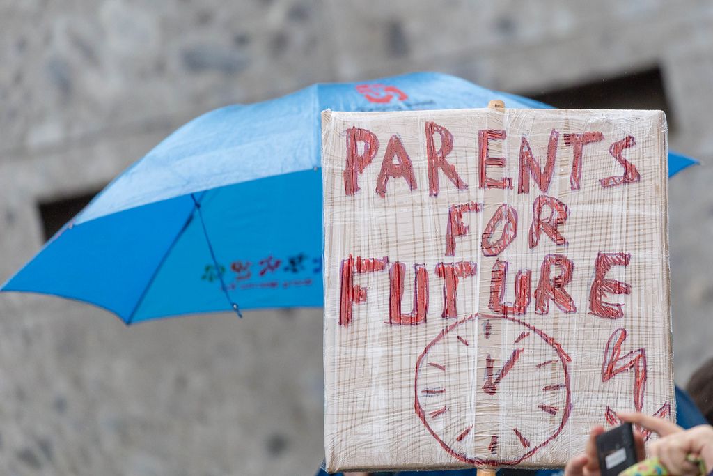 Parents demonstrate with 'Parents for Future' sign at Fridays For Future in Cologne