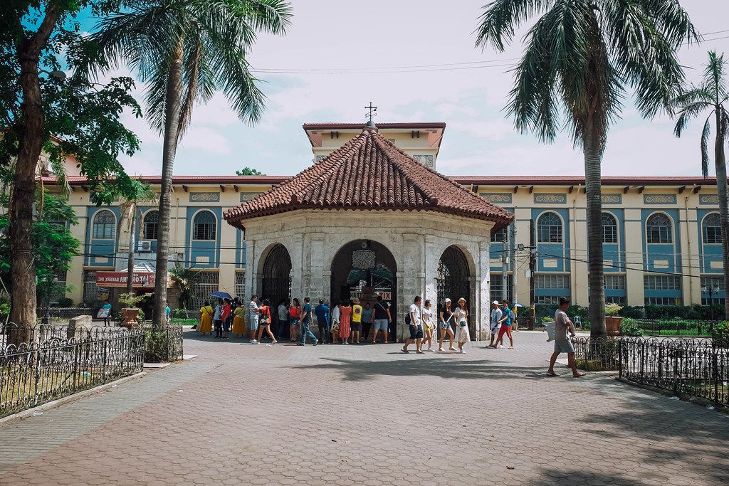 People gathering at the famous Magellan's Cross (Flip 2019)