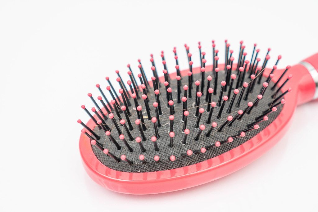 Pink-Comb-Brush-for-girls-above-white-background.jpg