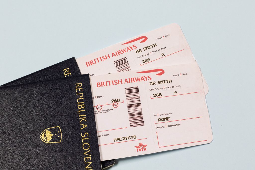 plane tickets lying in passport