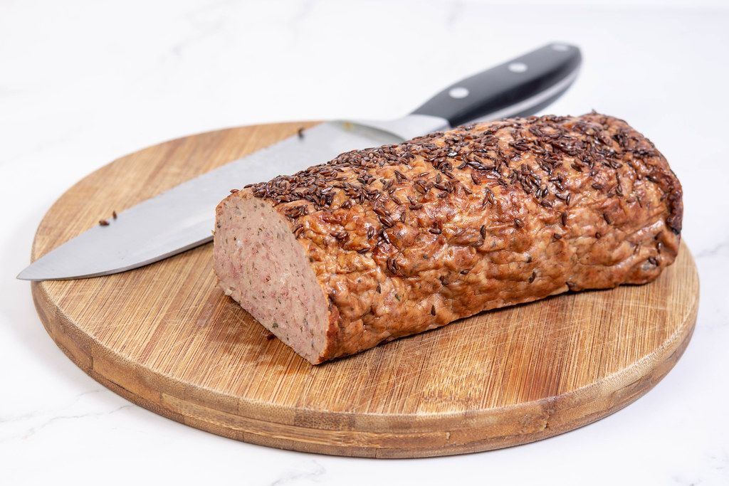 Pork and Chicken Meat Loaf with Cumin on the wooden board