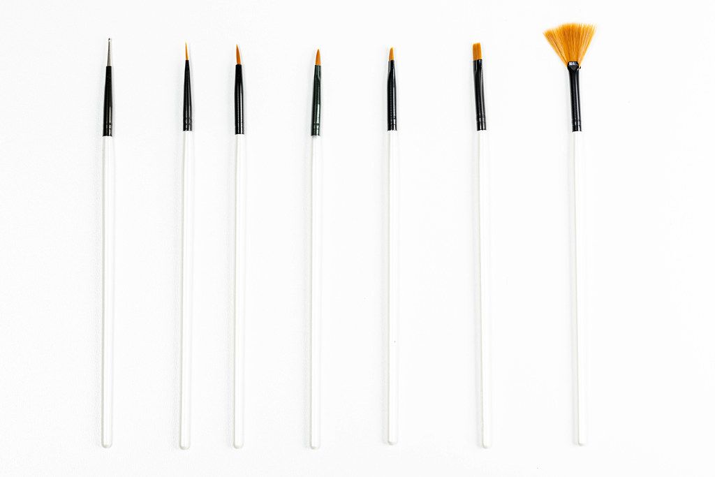 Professional makeup brush set on white background