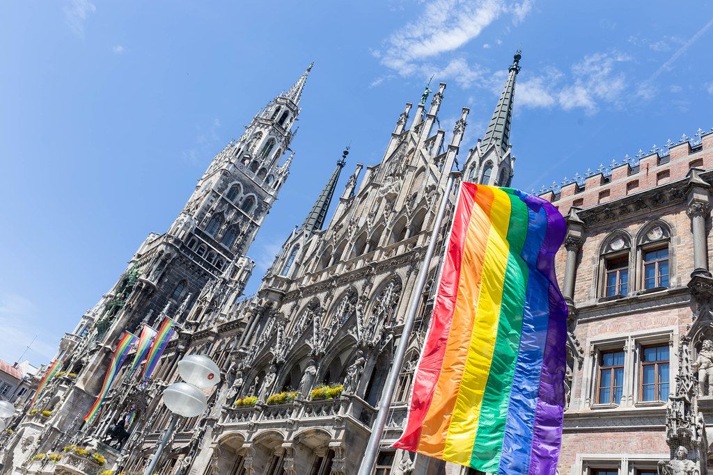 Rainbow flag as international symbol of the gay-lesbian community at Marienplatz, during the CSD-Technoparade for Munich Pride
