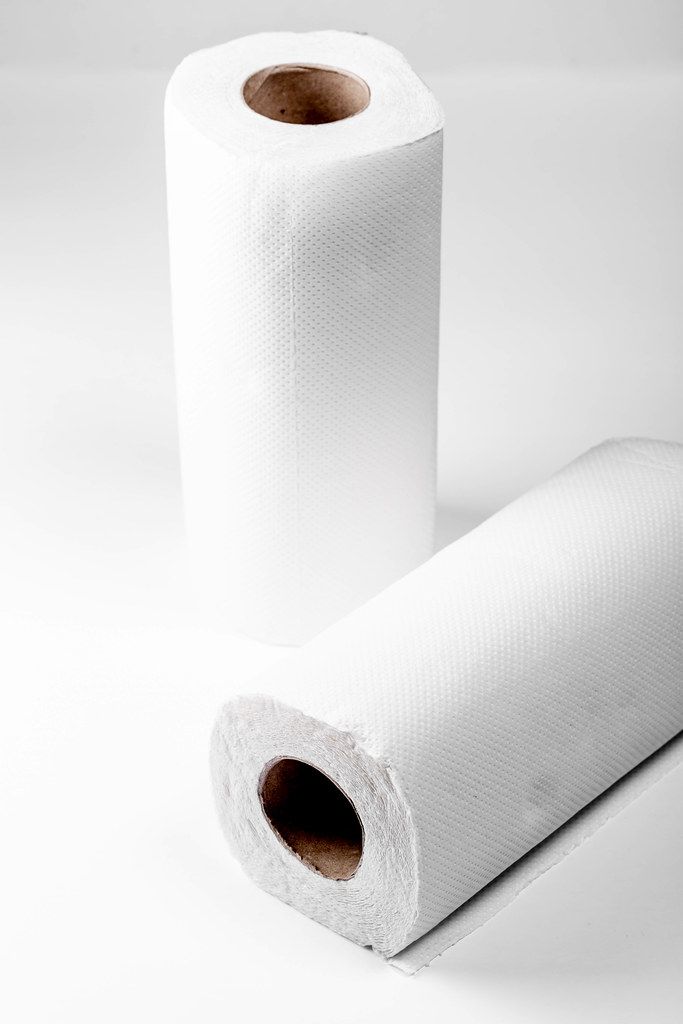 Rolls of paper towels on white