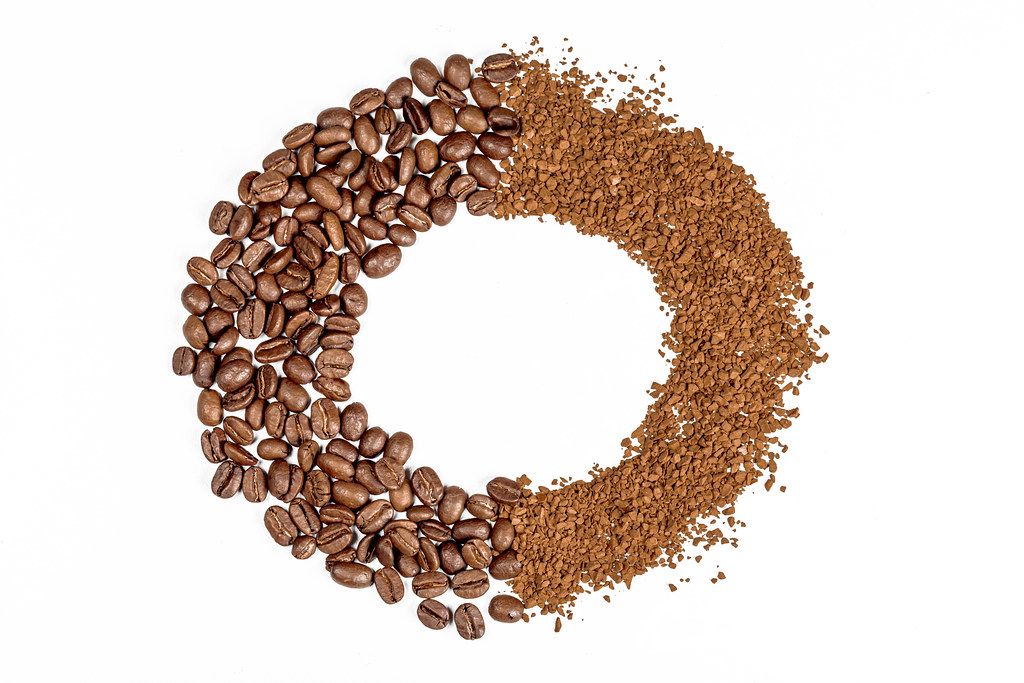 Round coffee frame on white background, top view