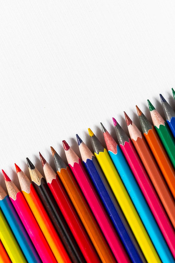 Row of colored pencils on white background (Flip 2019)