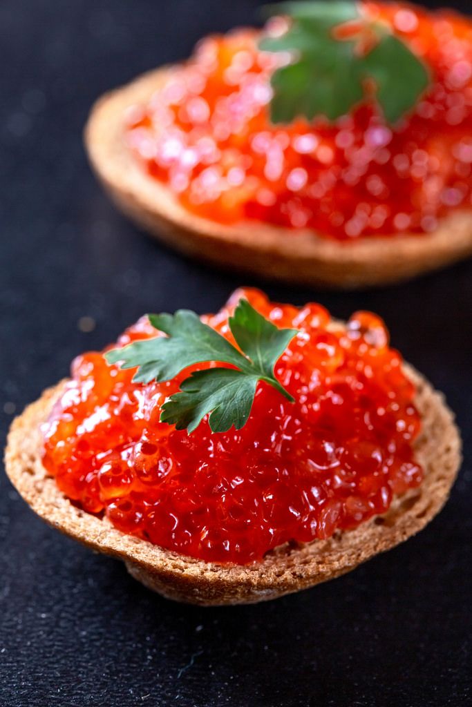 Sandwiches with red caviar and bread