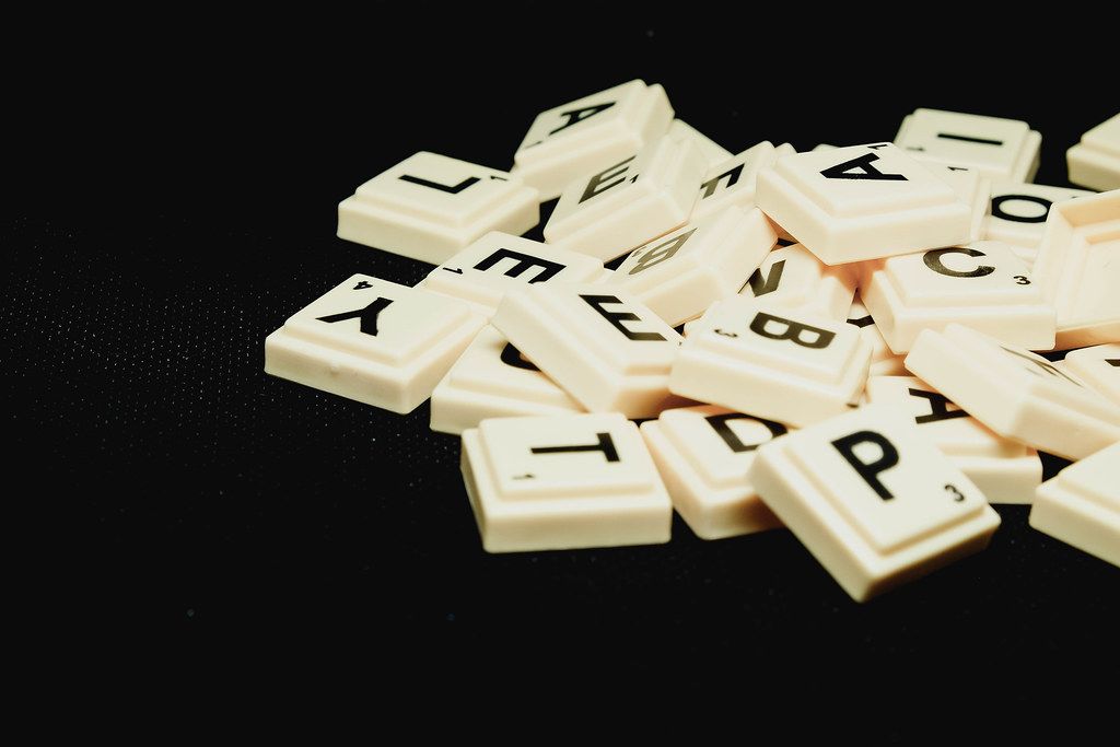 Scrabble on black background