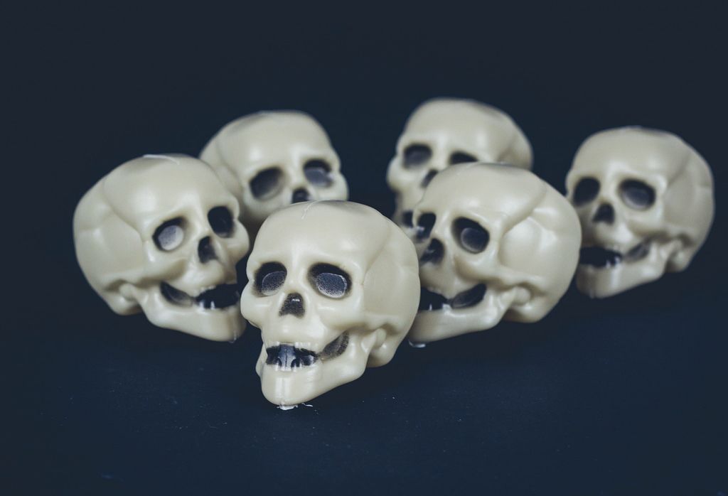 Skulls on dark background